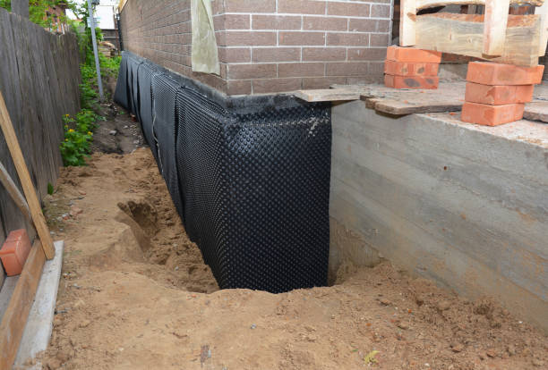 Happy homeowners after waterproofing job in Willow Grove